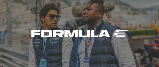 Formula E crew members in branded attire, featuring the Formula E logo prominently in the image., FormulaE, crew_members