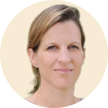 portrait of a woman with light brown hair and a neutral expression against a pale background, female professional headshot