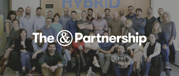 team photo, The & Partnership branding